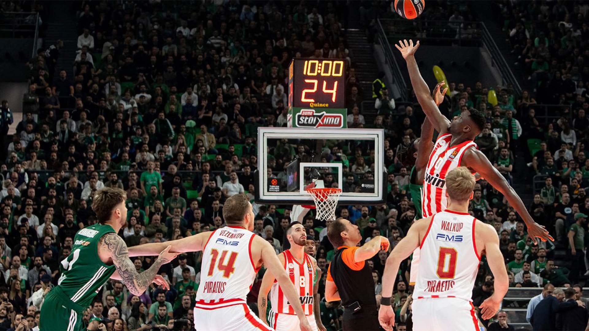 basketball players playing on court